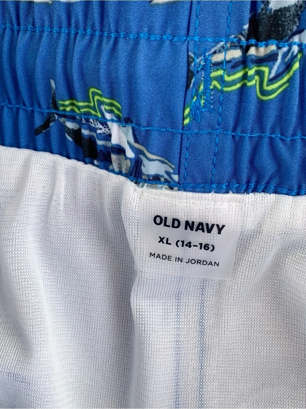 Old Navy New Boy's shark swim trunks in blue size XL